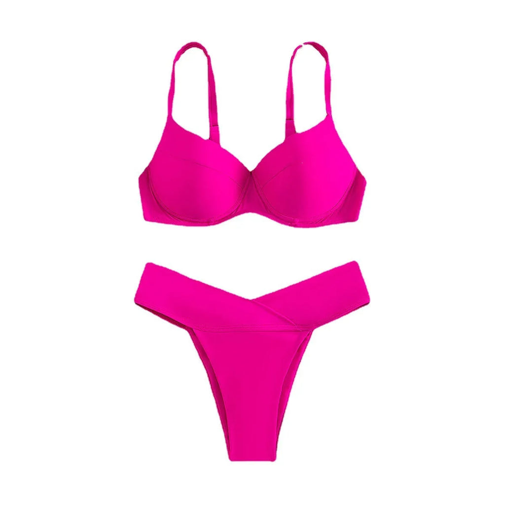 Solid colour bikini swimsuit in fluorescent pink on a mannequin, showing briefs style and sleeveless design.