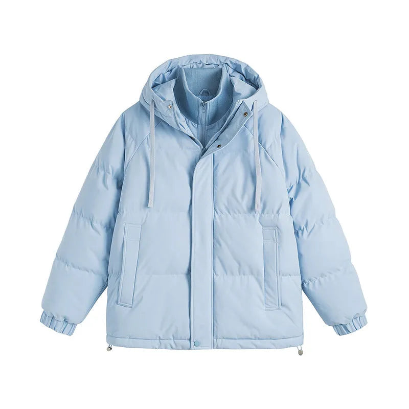 Beige loose fake cotton-padded winter jacket with side seam pockets on a mannequin.