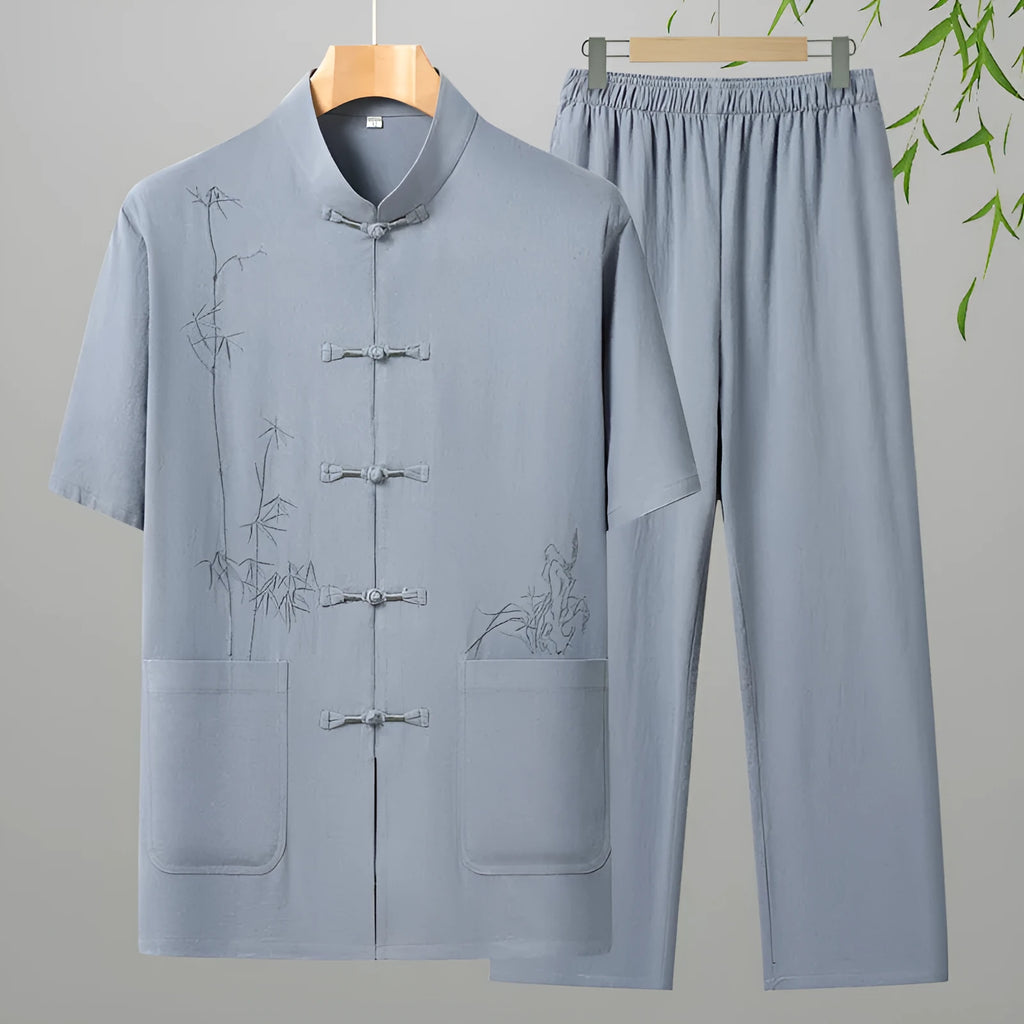 Gray cotton short-sleeved leisure suit set for elderly men with top and pants on display