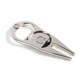 Zinc alloy golf ball yoke and bottle opener tool in black, green or silver on a putting green