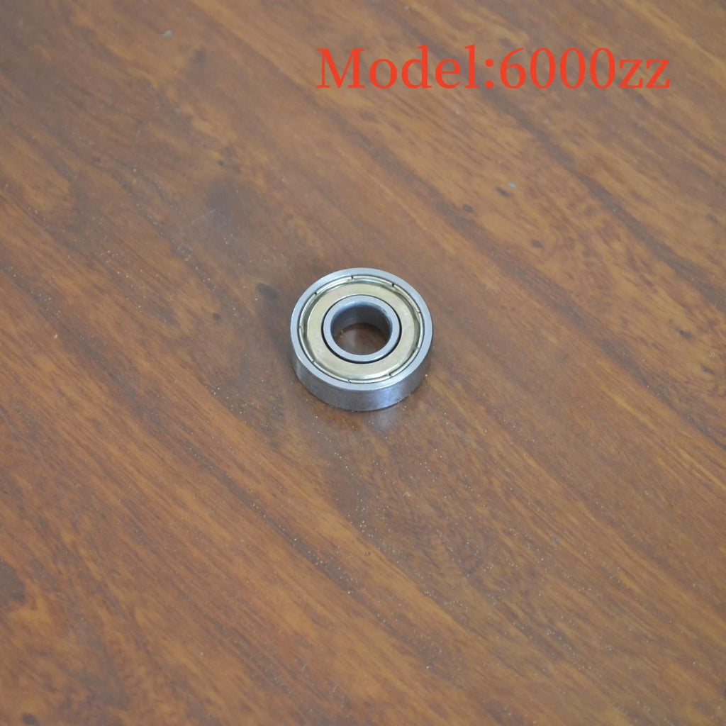 Carbon steel bearing 6000zz with dimensions 10x26x8mm on a white background