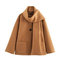 Women's longline polyester coat with artificial fur collar in street fashion style, shown in a choice of colours.