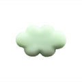 Resin cartoon car fragrance clip in one of six colours attached to vehicle air vent
