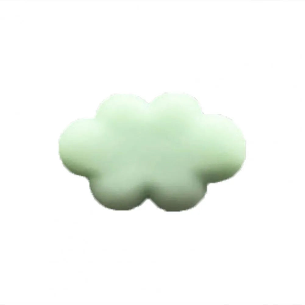 Resin cartoon car fragrance clip in one of six colours attached to vehicle air vent