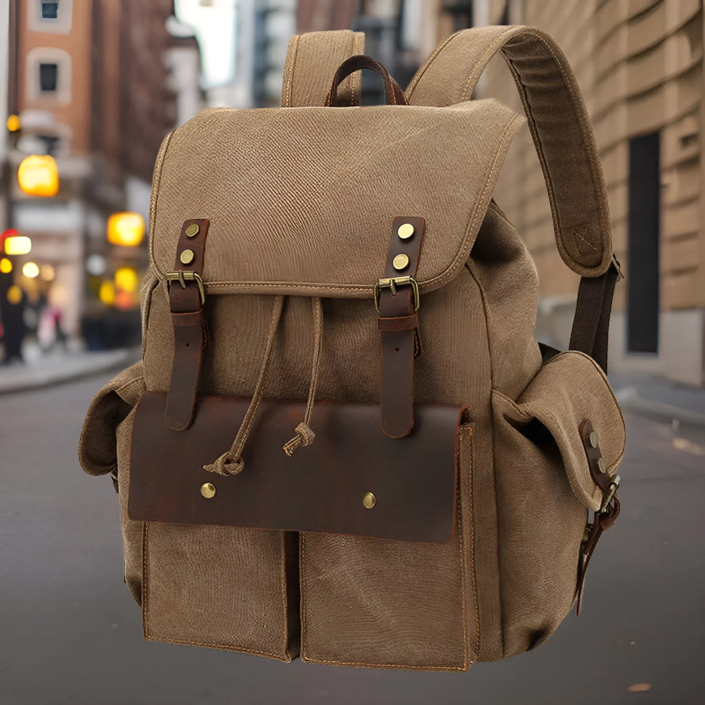 Retro canvas backpack in military green with antique bronze hardware, 33x42x16cm, for 16-inch laptop travel
