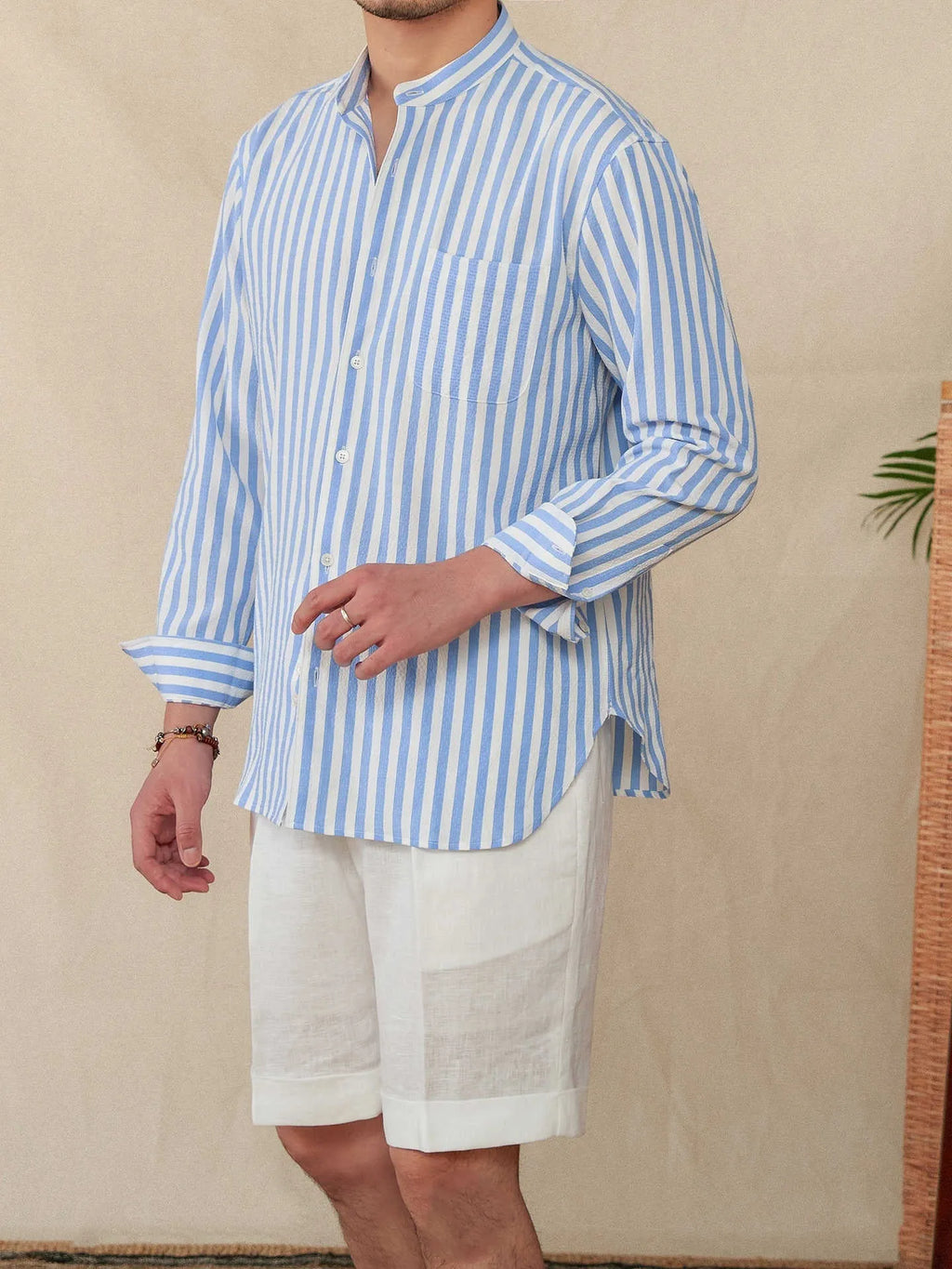 Loose fit striped seersucker long sleeve shirt with baseball collar in blue and white for men