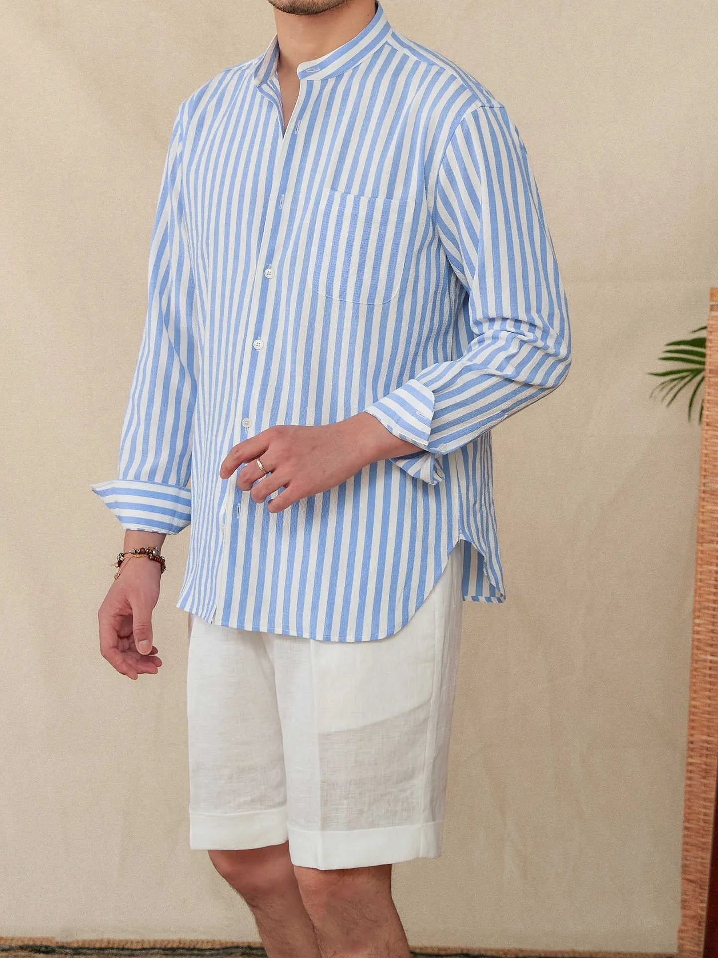 Loose fit striped seersucker long sleeve shirt with baseball collar in blue and white for men