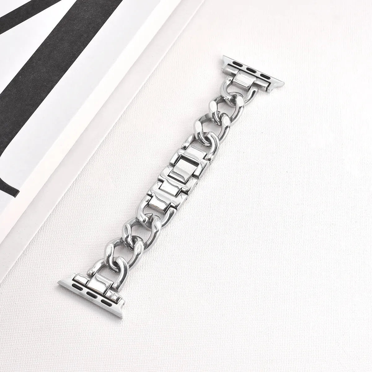 Denim chain metal Apple Watch compatible strap in silver, black, gold, rose gold, and starlight colours for 38-49mm cases.