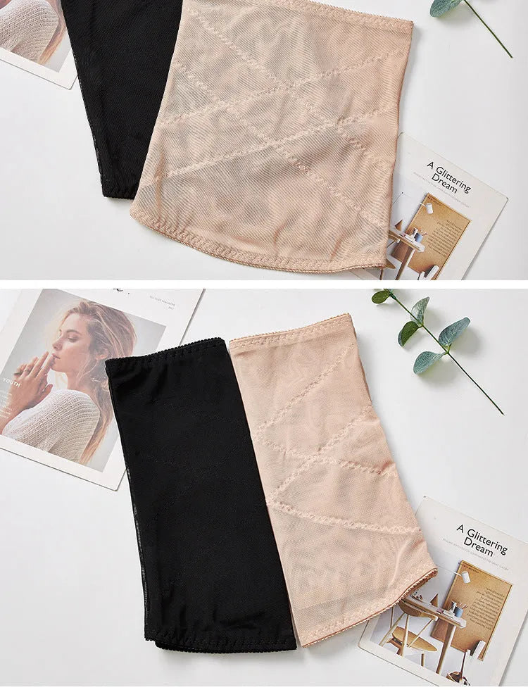 Black mesh postpartum belly band for waist trimming and tummy slimming laid flat.