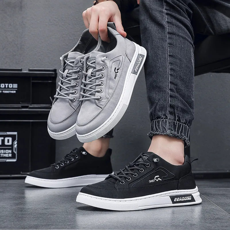 Men's grey casual shoes with canvas upper, leather lining, rubber sole, low-top, and lace-up front