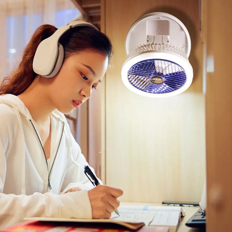 USB charging foldable table fan with LED light in blue, showing 4 speed settings and 300° rotation for home cooling