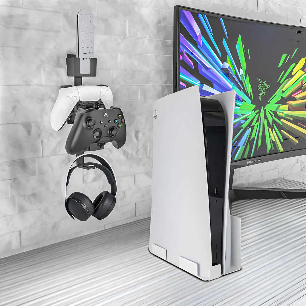 White ABS plastic wall-mounted hook holding a PS5 controller and gaming headset.