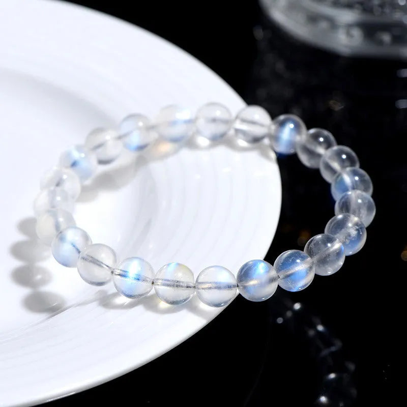 Natural cream body blue moonlight crystal bracelet with ground finish beads available in various sizes