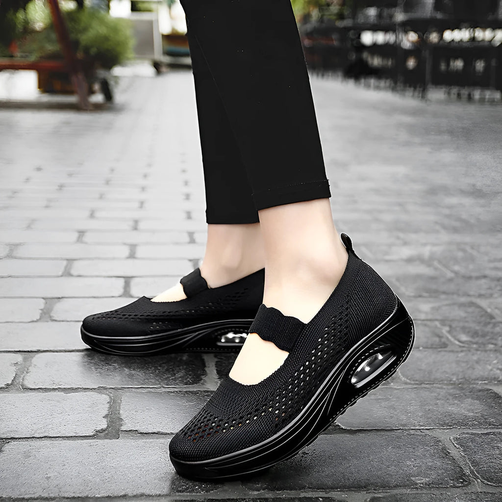 Women's slip-on mesh shoes in beige, round toe, low heel, casual style on neutral background