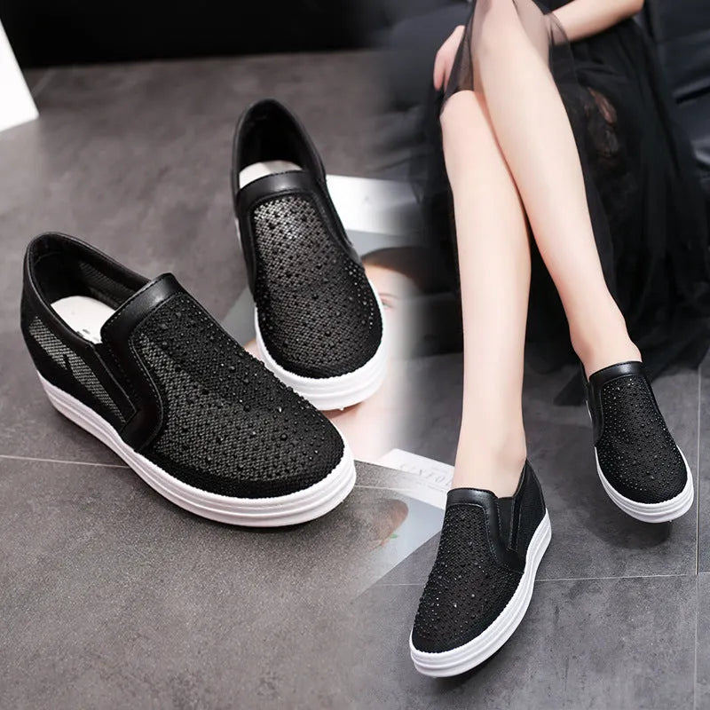 Women's breathable wedge slip-on shoes in black with mesh upper and rubber sole