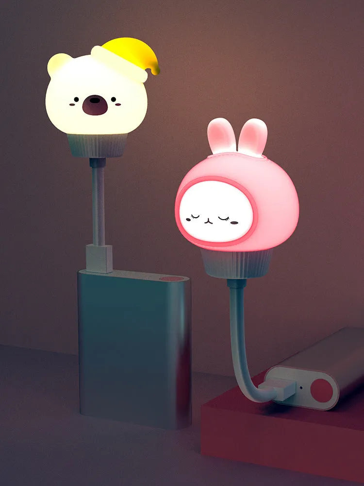 Cartoon animal USB night light with remote control showing bear, rabbit, duck and kitten designs