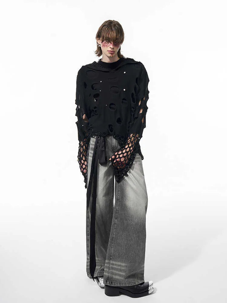 Black men's loose fit hoodie with pearl decorative trim on the hood, a pullover style for spring.