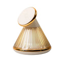 Night table lamp with magnetic wireless charger base in champagne gold, showing Type-C port and adjustable brightness controls