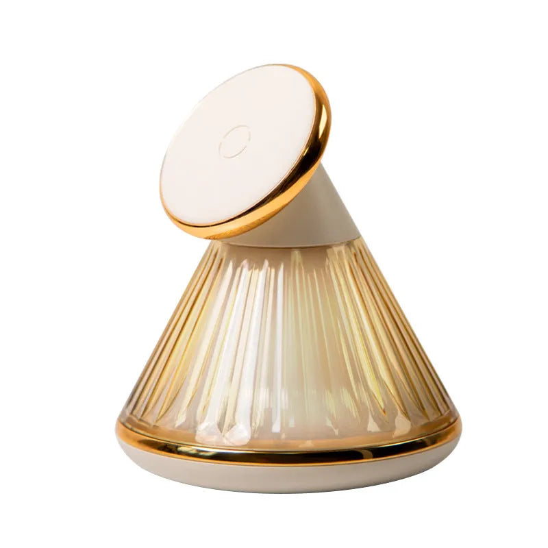 Night table lamp with magnetic wireless charger base in champagne gold, showing Type-C port and adjustable brightness controls