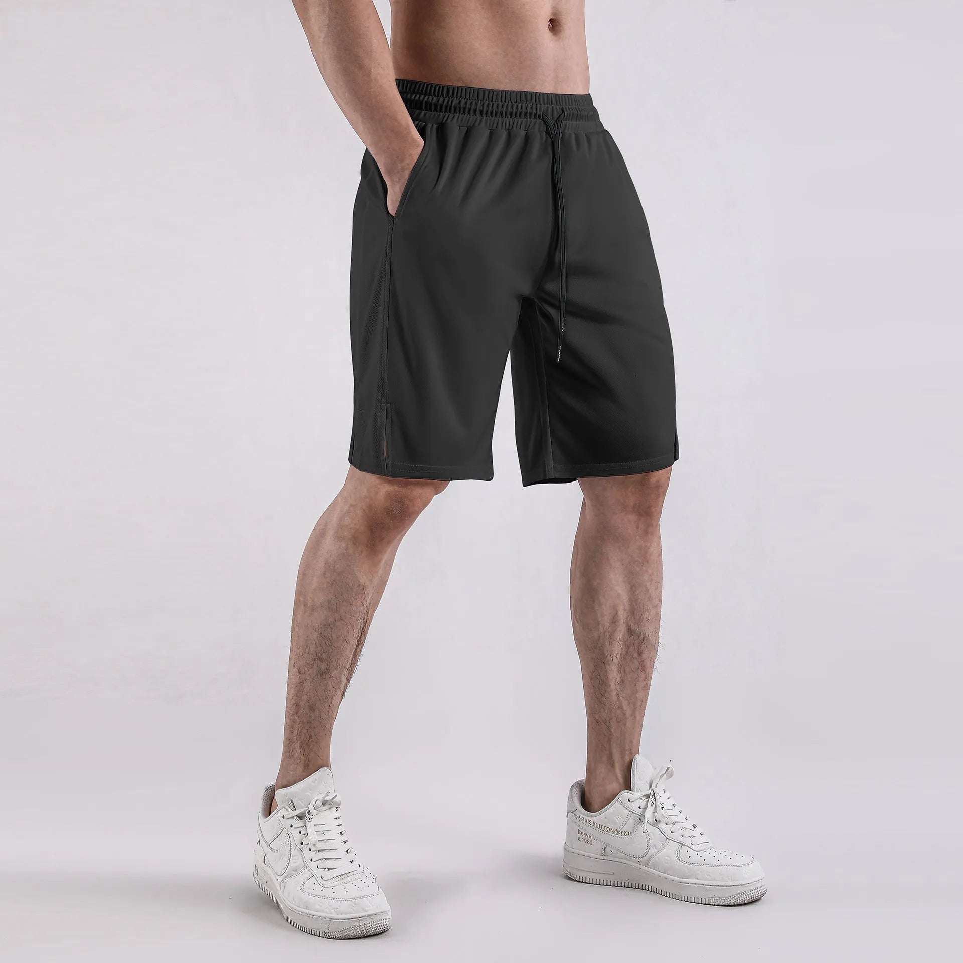 Men's black quick-drying mesh shorts with elastic waistband and loose fit for sports casual wear