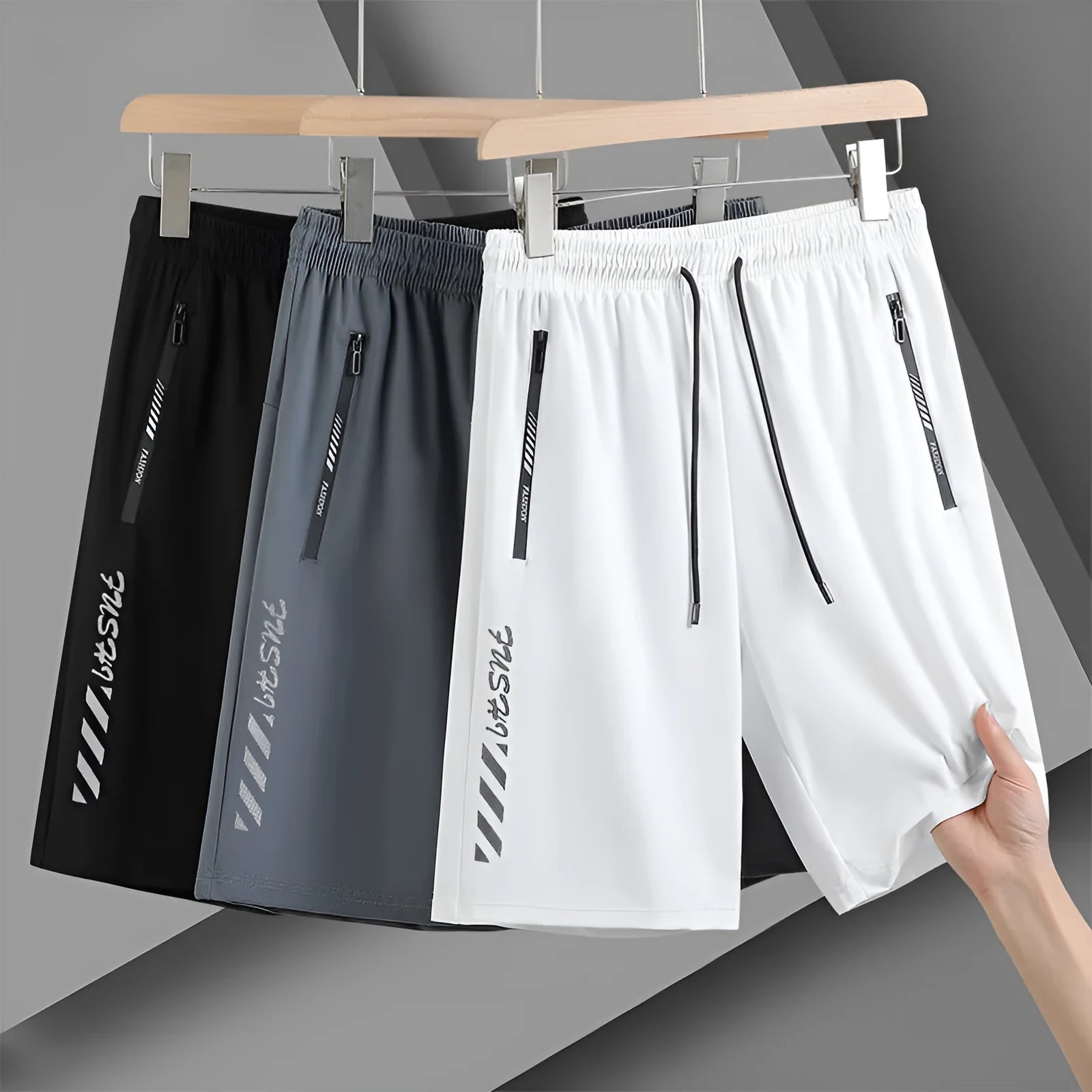 Men's black nylon quick-drying sports shorts with loose fit and elastic waistband.