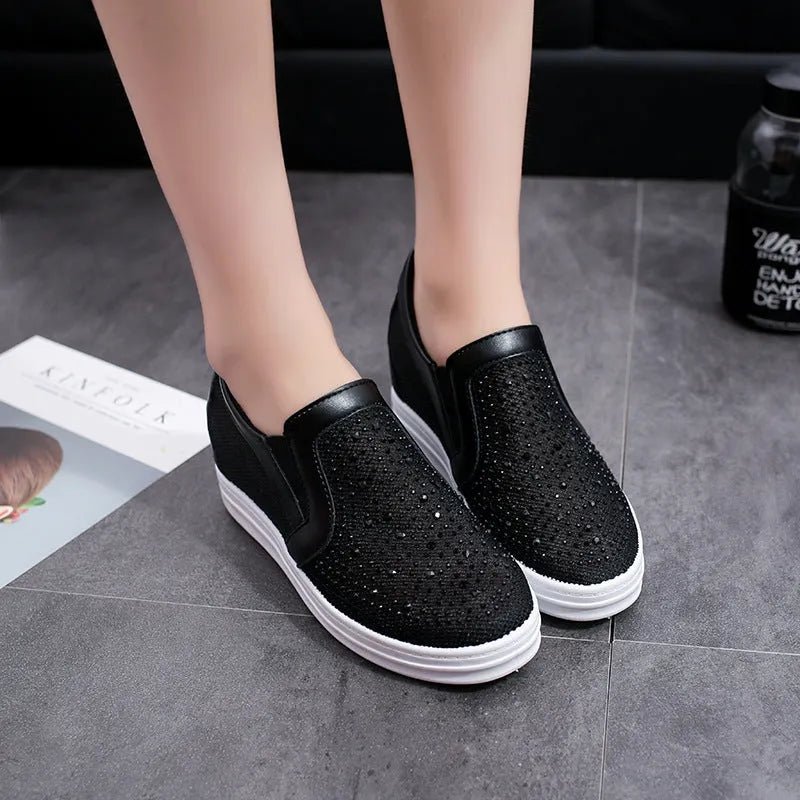 Women's breathable wedge slip-on shoes in black with mesh upper and rubber sole