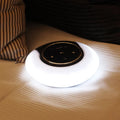 Blue folding Bluetooth desk lamp speaker with touch controls and LED light.