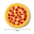 Yellow plush pizza-shaped dog toy with a squeaker inside for chewing and interactive play.