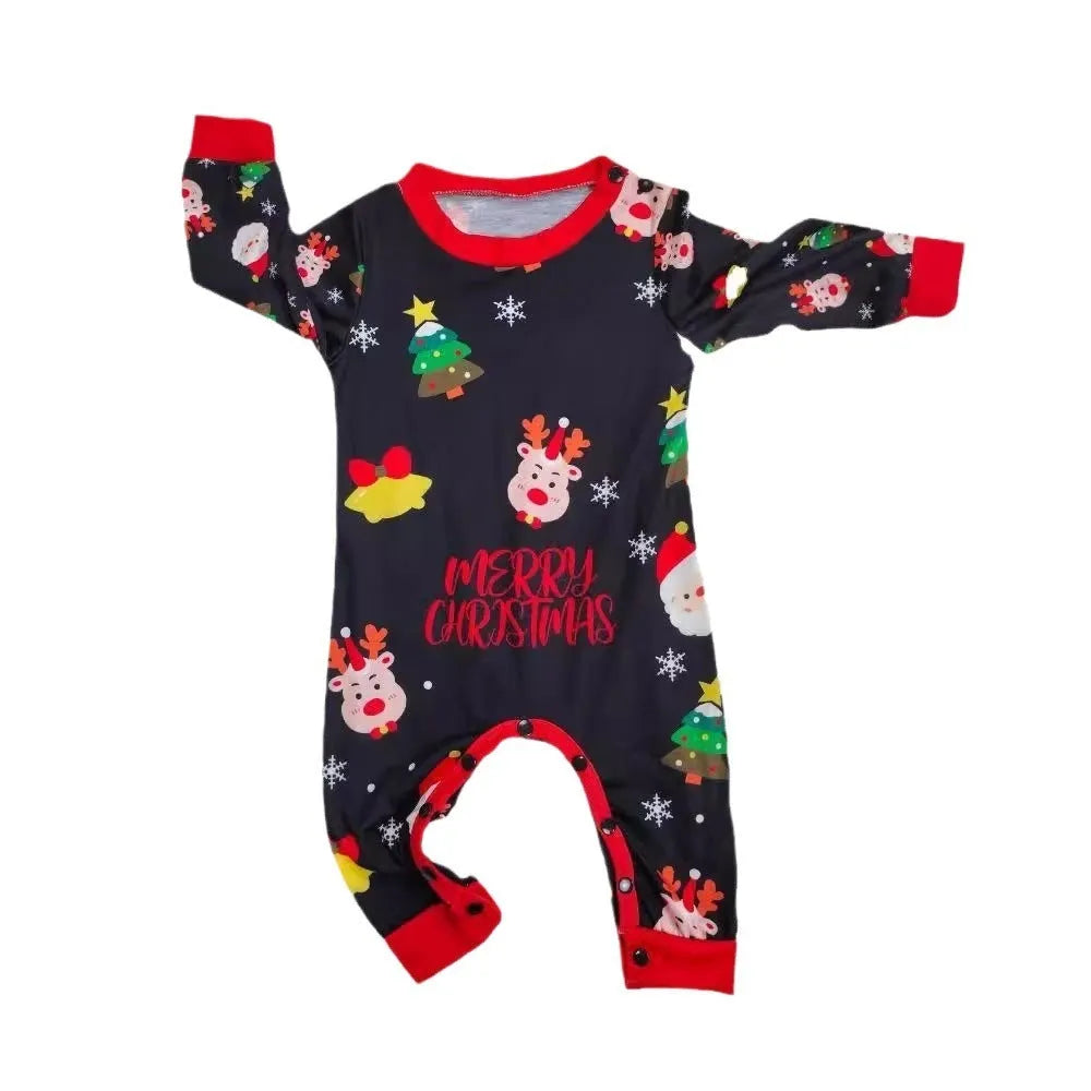 Family wearing matching red plaid Christmas pyjamas, including parents, children, baby, and dog.