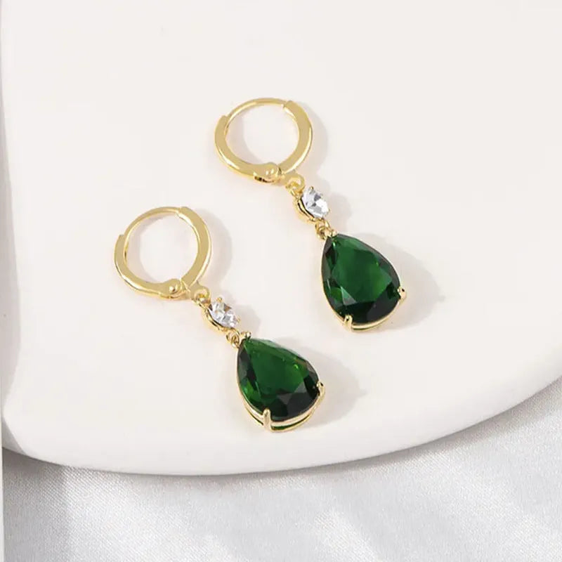 Geometric teardrop earrings in emerald green colour with alloy construction