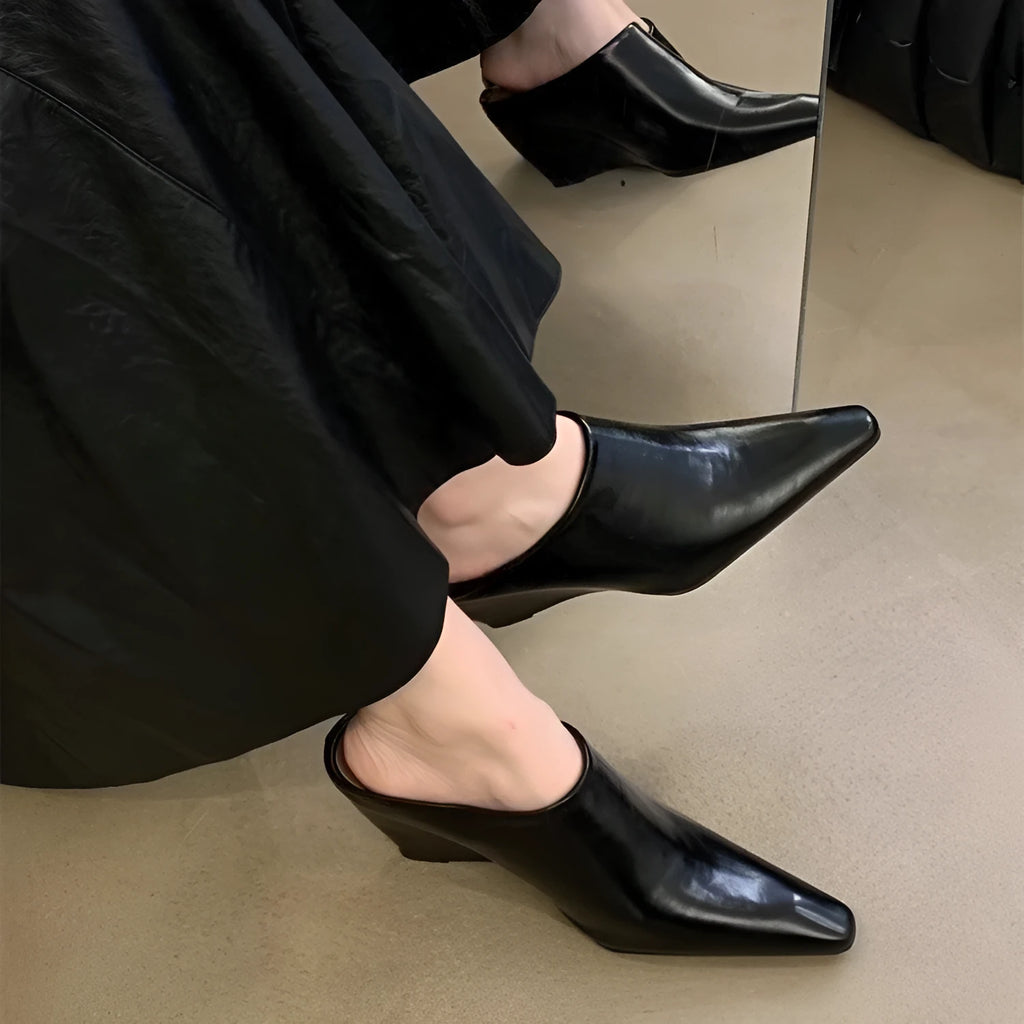 Wind wedge closed toe half slippers for women in PU upper, available in Black, Brown, and Off White