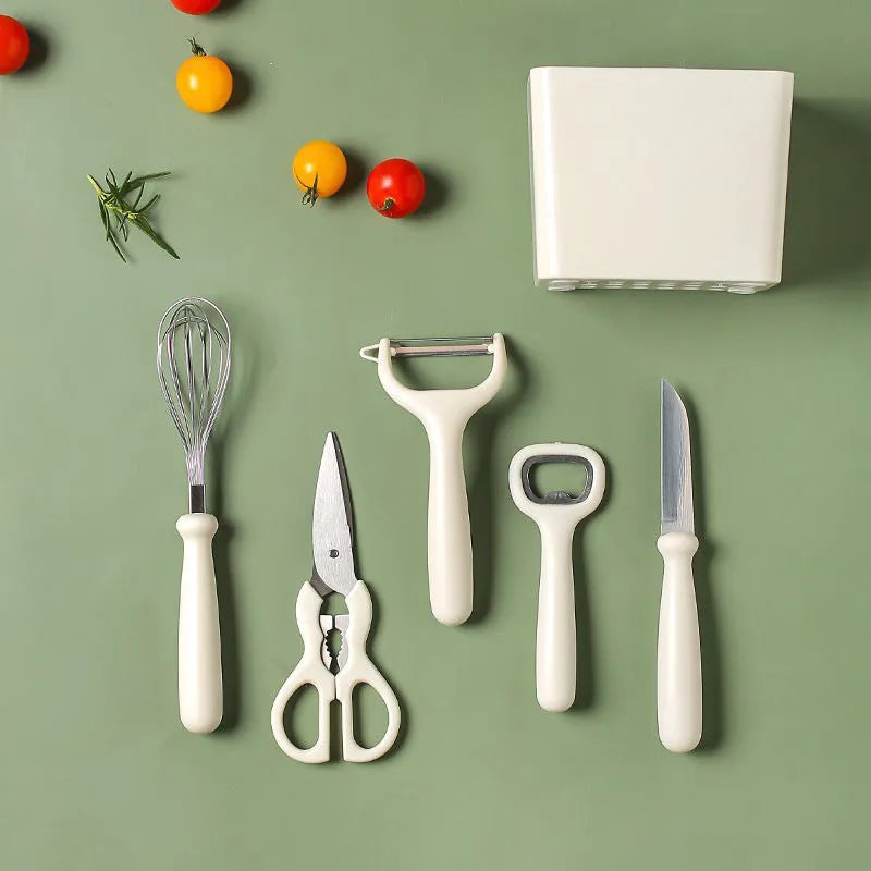 Six-piece white stainless steel kitchen gadget set with modern simplicity design on a clean surface