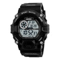 Digital sports watch with round dial, plastic strap, showing GMT display and available in army green colour.
