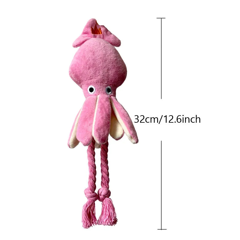 Pink squid-shaped plush dog chew toy with squeaky whistle, corduroy fabric, 32cm body length