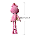 Pink squid-shaped plush dog chew toy with squeaky whistle, corduroy fabric, 32cm body length