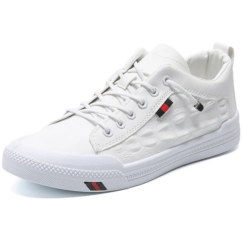 White men's casual sneakers with lace-up closure, rubber sole, and round toe cap on a plain background
