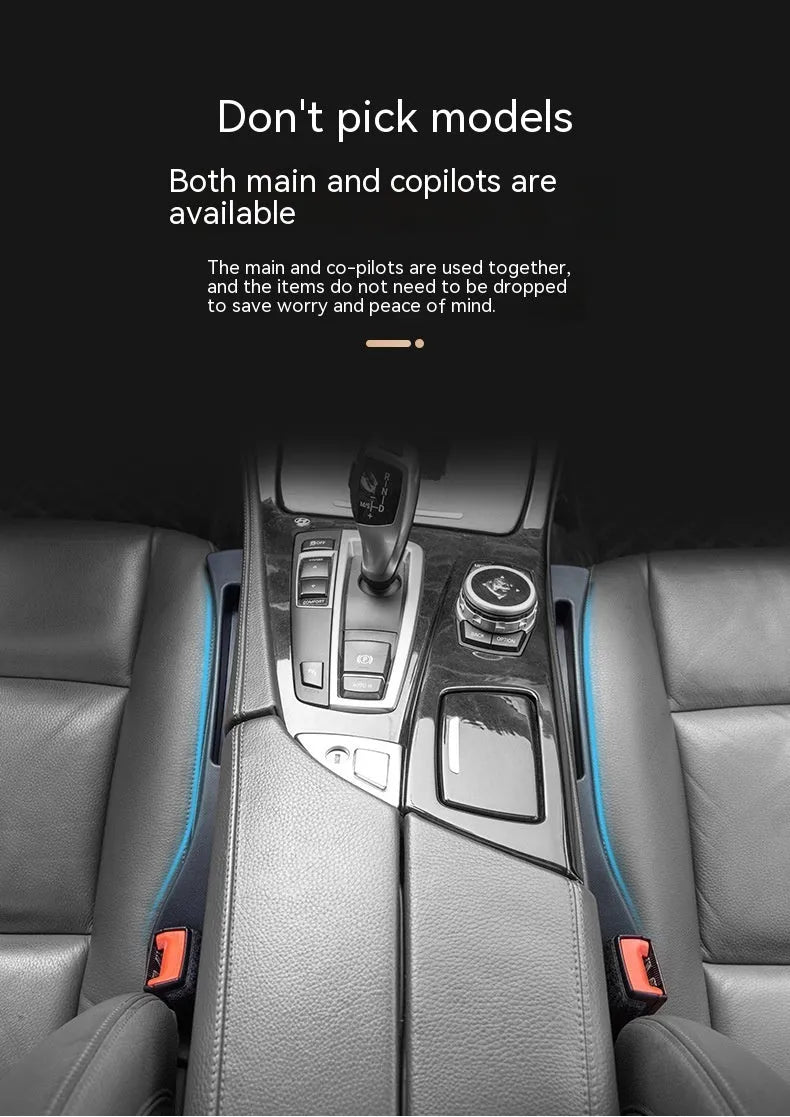 Black car seat gap storage box with handle between vehicle seats
