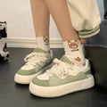 Women's green casual shoes with PU mesh upper and flat heel design