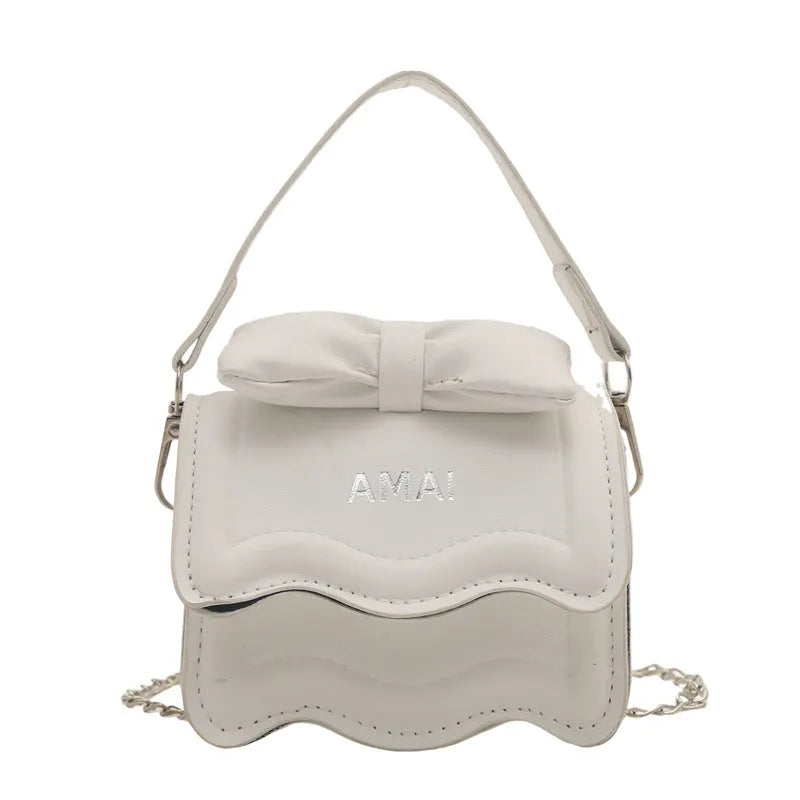 Women's mini crossbody bag in PU leather, available in several colour options with single strap