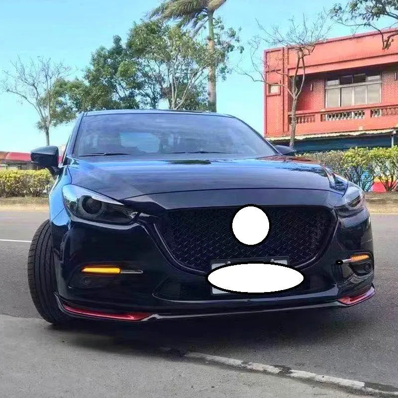 Audi A1 8X front splitter retrofit kit with three-section design in black Unksera pattern.