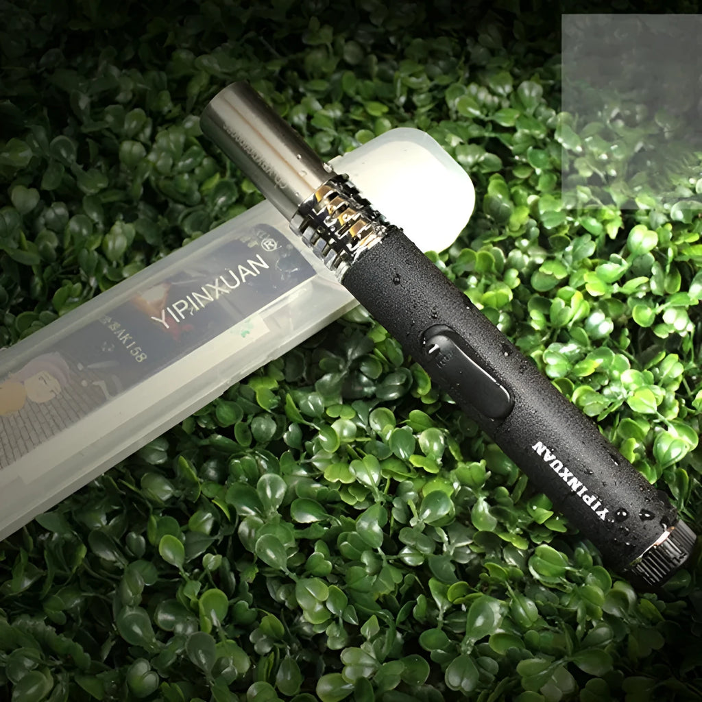 Black metal portable flamethrower with frosted finish and child lock for outdoor BBQ and camping use