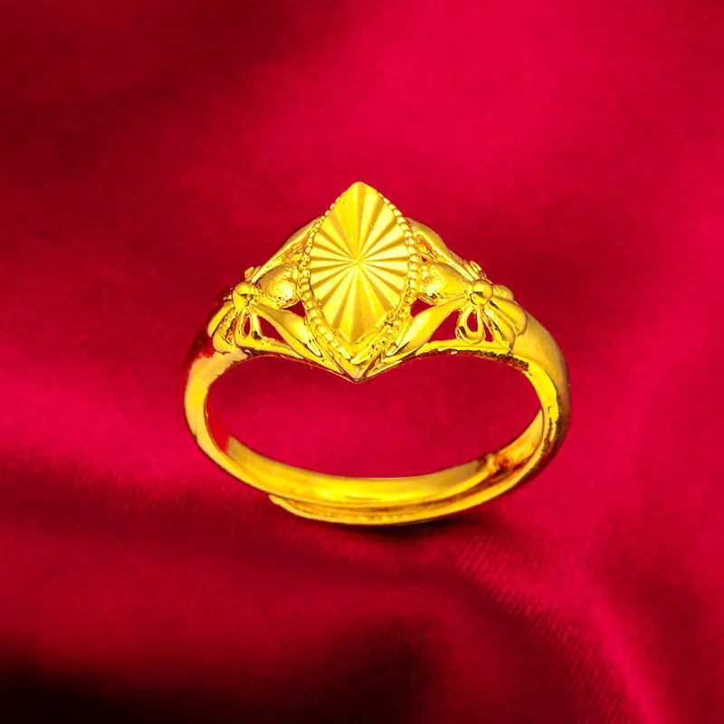 Alluvial gold electroplated brass ring with open diamond floral geometric design and textured band