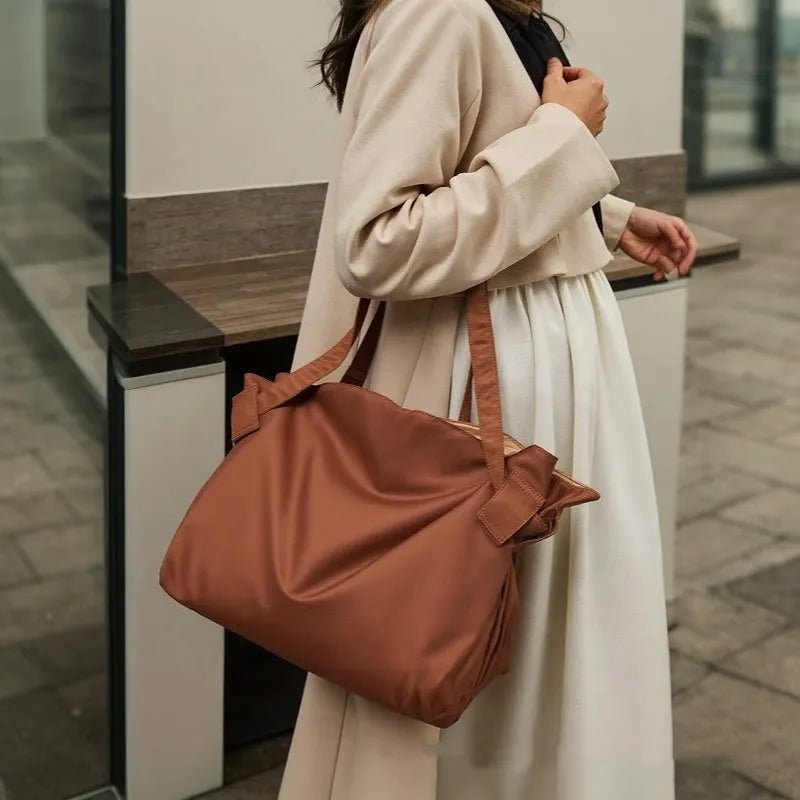 Large capacity shoulder crossbody luggage bag for women in black Oxford cloth with solid colour design