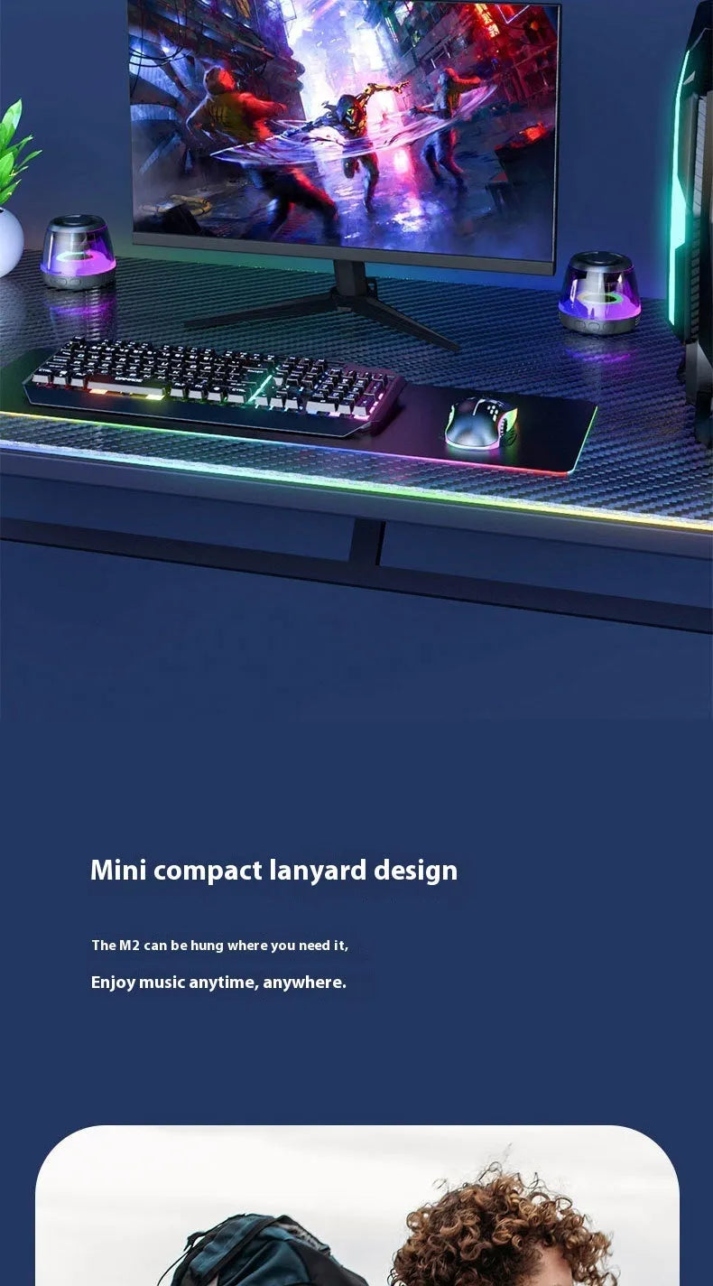 White portable Bluetooth speaker with LED ambience light and magnetic mini design on a desktop