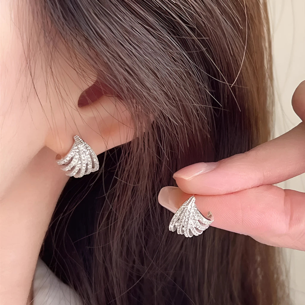 Geometric platinum electroplated zircon earrings for women with European and American style design