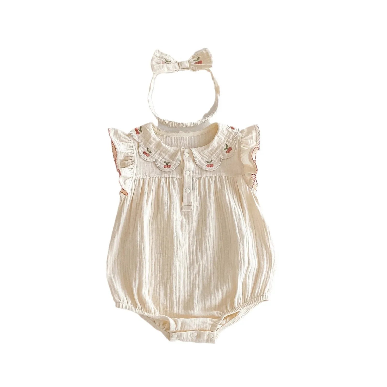 Summer cotton baby jumpsuit in apricot with double-breasted closure and matching hair band