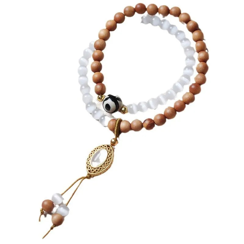Barbie sandalwood double circle opal Tibetan bead bracelet with polished finish