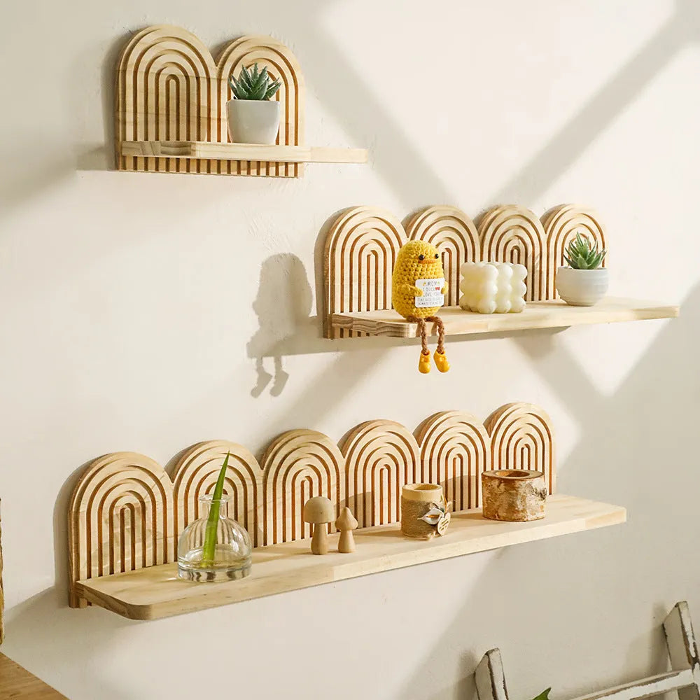 Multi-layer solid wood wall flower pot storage rack hanging on a white wall with indoor plants