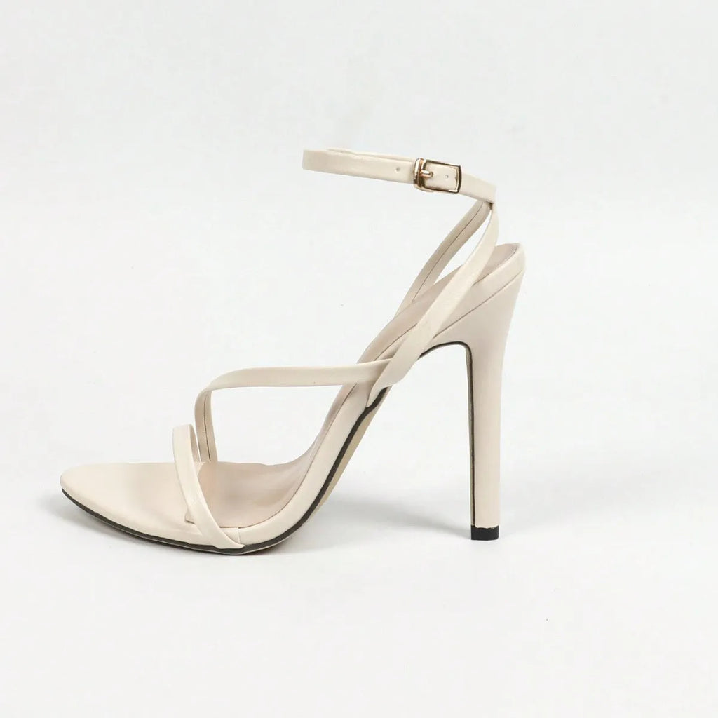 Women's sandals with cross ankle strap and multi-stripe pattern in gold colour with round toe open toe design