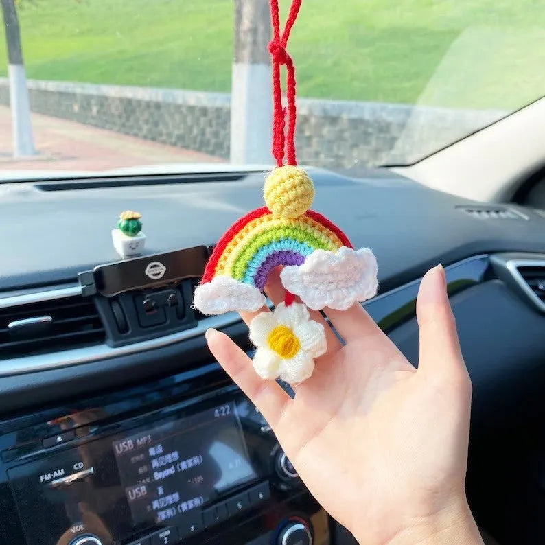 Handmade wool crocheted car pendant in avocado, pink rainbow, and red rainbow colour options